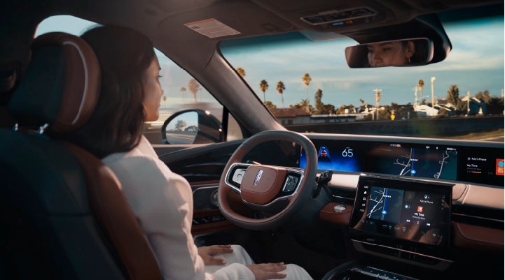A person is shown driving hands-free on the highway with available Lincoln BlueCruise technology. | Sheehy Lincoln of Gaithersburg in Gaithersburg MD