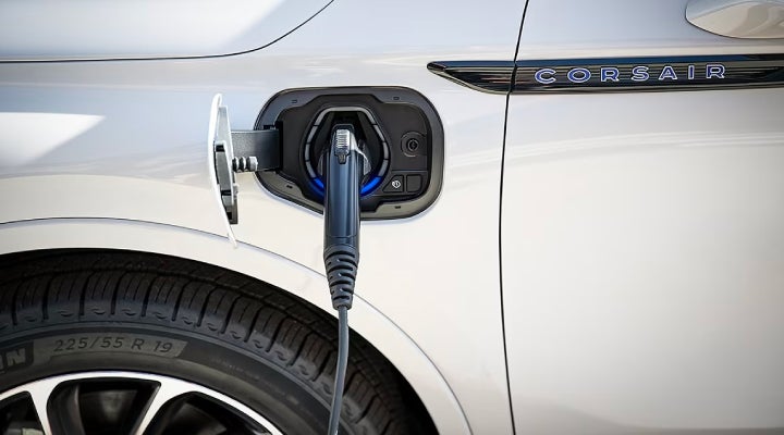 An electric charger is shown plugged into the charging port of a Lincoln Corsair® Grand Touring
model. | Sheehy Lincoln of Gaithersburg in Gaithersburg MD