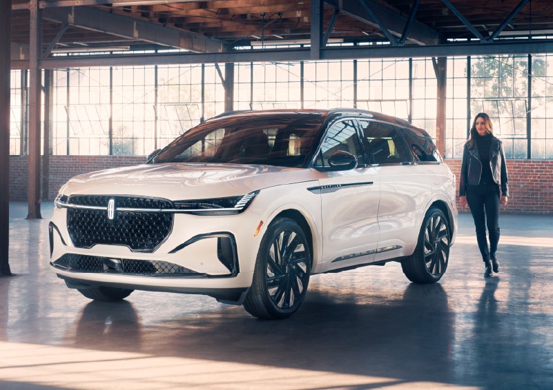 A person approaches a 2025 Lincoln Nautilus® SUV. | Sheehy Lincoln of Gaithersburg in Gaithersburg MD