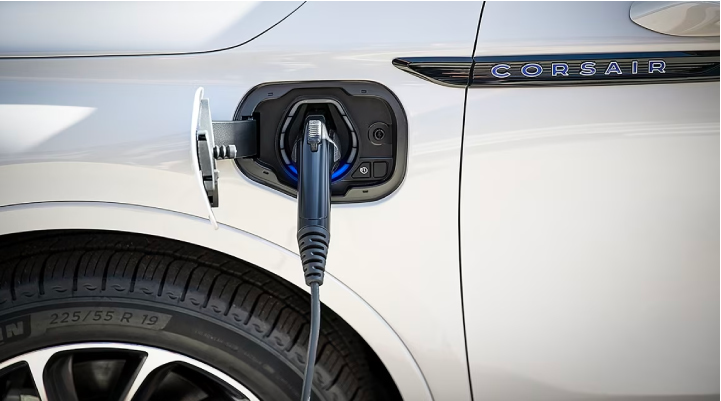 An electric charger is shown plugged into the charging port of a Lincoln Corsair® Grand Touring
model. | Sheehy Lincoln of Gaithersburg in Gaithersburg MD