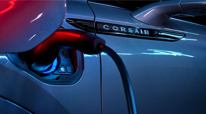 A charger plugged into the charging port of a 2025 Lincoln Corsair® Plug-in Hybrid model. | Sheehy Lincoln of Gaithersburg in Gaithersburg MD