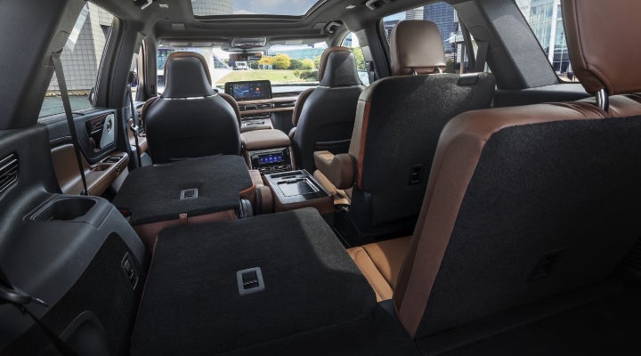 One side of the PowerFold® third-row seat and a second-row seat are folded forward in the 2026 Lincoln Aviator® SUV. | Sheehy Lincoln of Gaithersburg in Gaithersburg MD