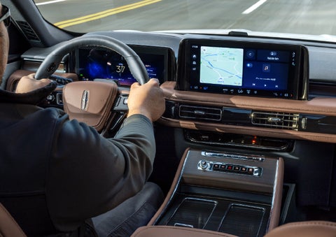 A person is driving a 2026 Lincoln Aviator® SUV as seen from inside the cabin. | Sheehy Lincoln of Gaithersburg in Gaithersburg MD