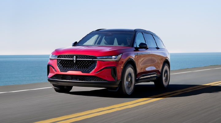 A 2026 Lincoln Nautilus® SUV is being driven on a seaside roadway. | Sheehy Lincoln of Gaithersburg in Gaithersburg MD