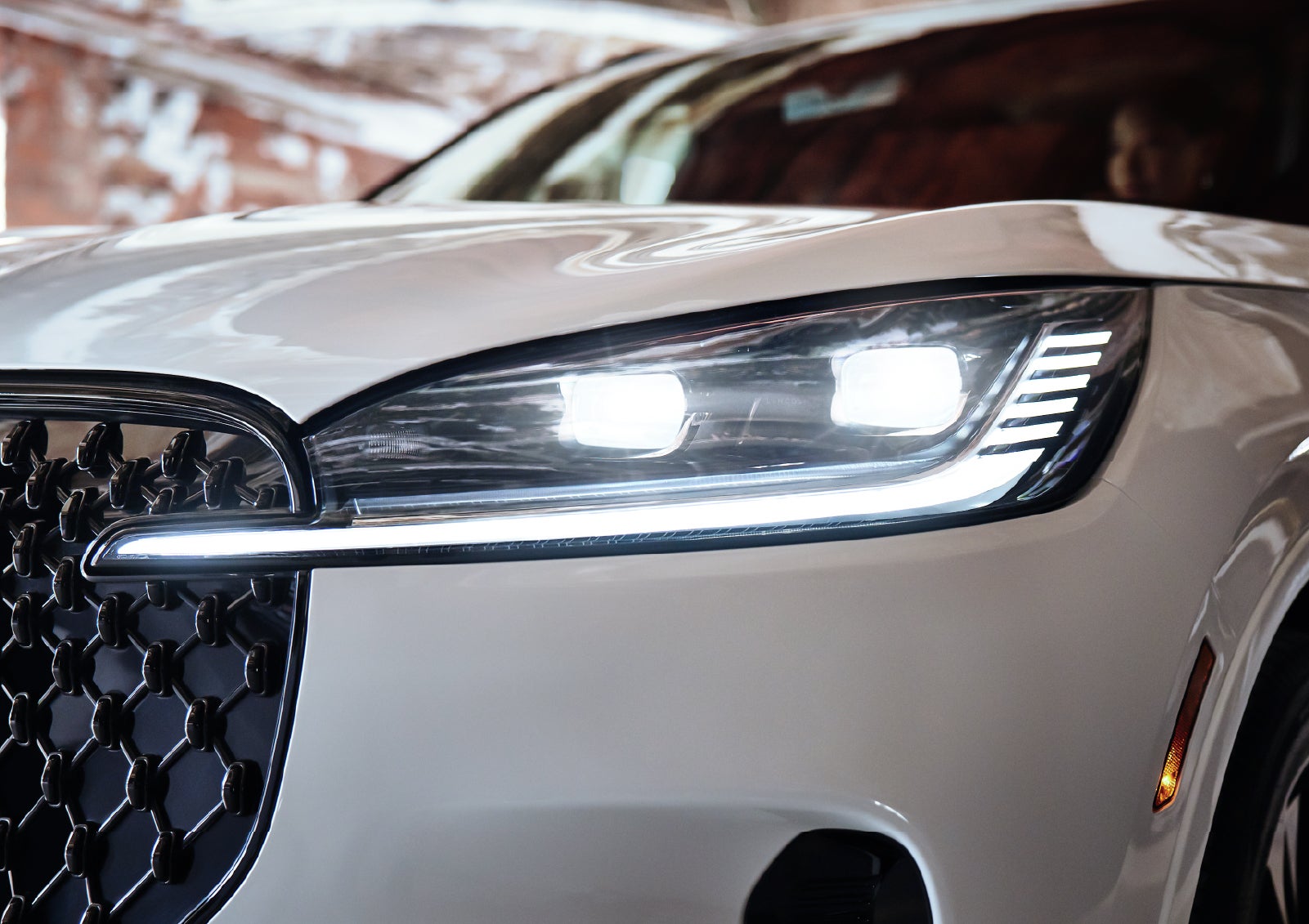 A close-up of a headlamp on the 2027 Lincoln Aviator® SUV is shown. | Sheehy Lincoln of Gaithersburg in Gaithersburg MD