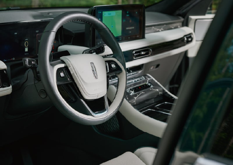 The leather-trimmed steering wheel of a 2027 Lincoln Aviator® Black Label™ SUV. | Sheehy Lincoln of Gaithersburg in Gaithersburg MD